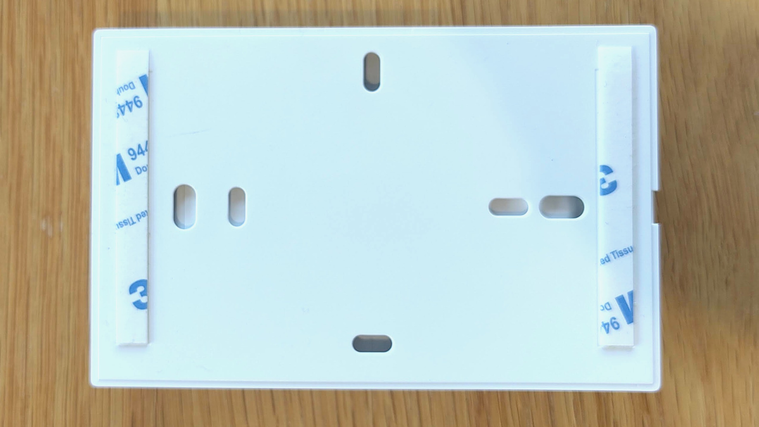 Back of Philips Hue Dimmer Switch mounting plate