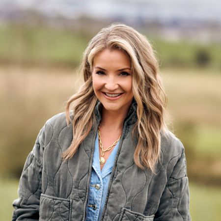 Helen Skelton standing in a field