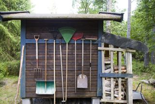 shed storage ideas: hanging tools outside shed