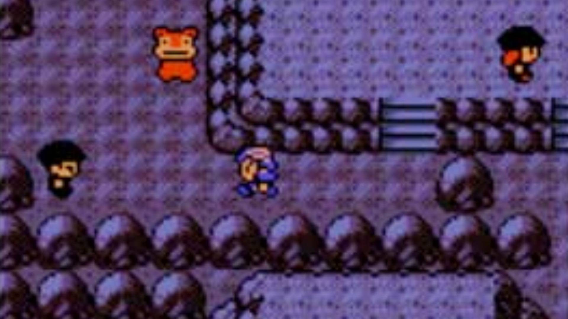 A screenshot from Pokemon Crystal of a trainer exploring Slowpoke Well.