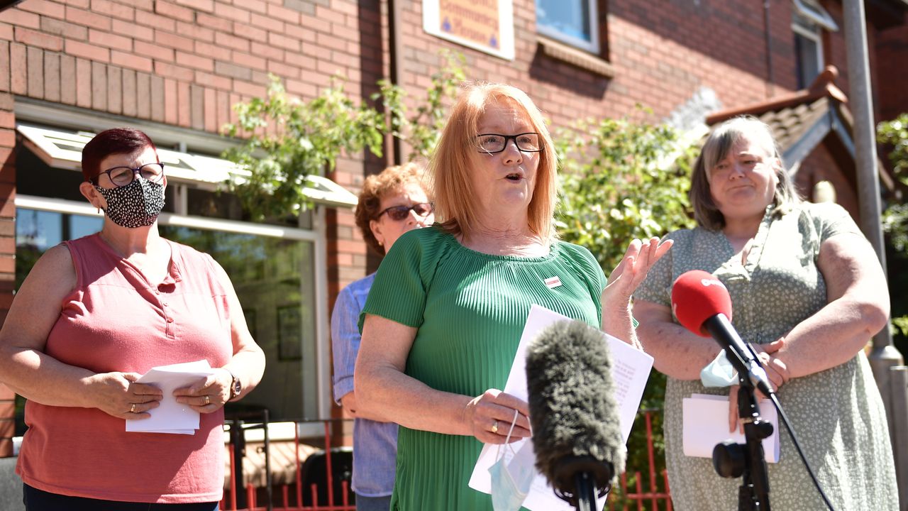 Families of victims of the 1971 Ballymurphy Massacre address reporters following Brandon Lewis’ announcement