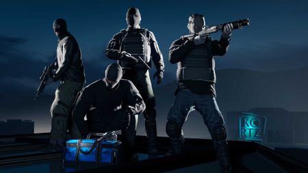 Masked robbers brandish guns and secure loot