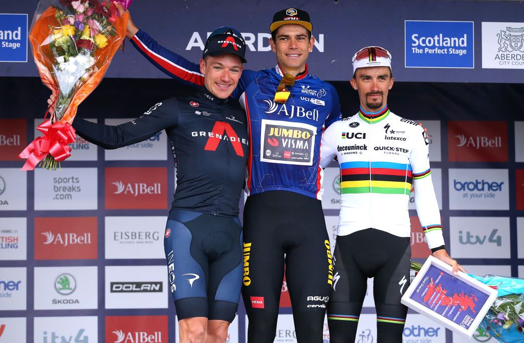 ABERDEEN SCOTLAND SEPTEMBER 12 LR Ethan Hayter of United Kingdom and Team INEOS Grenadiers in second place Wout Van Aert of Belgium and Team Jumbo Visma blue leader jersey and Julian Alaphilippe of France and Team Deceuninck QuickStep in third place celebrate winning on the podium ceremony after the 17th Tour of Britain 2021 Stage 8 a 173km stage from Stonehaven to Aberdeen TourofBritain TourofBritain on September 12 2021 in Aberdeen Scotland Photo by Alex LiveseyGetty Images