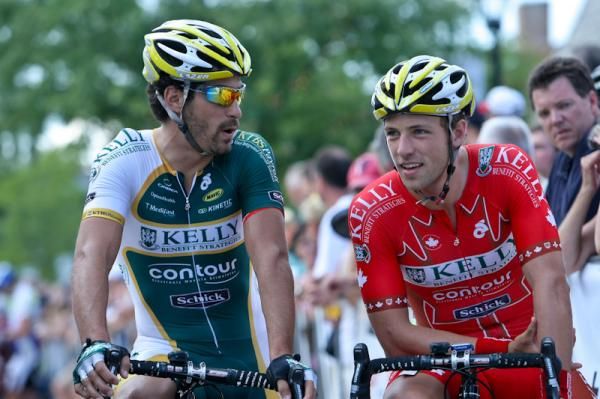 Alex Candelario (Kelly Benefits) chats with teammate and eventual race winner David Veilleux on the start line.