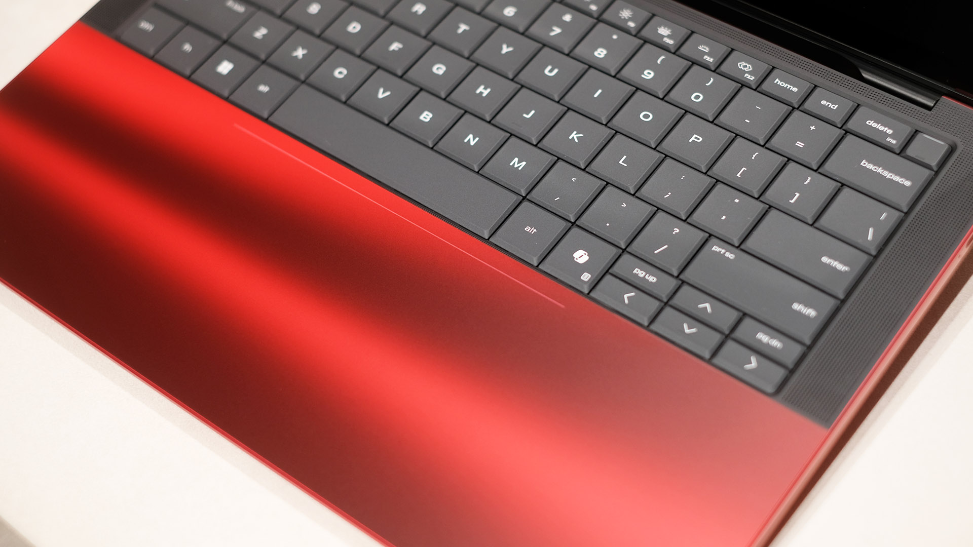 HP Ferrari laptop touchpad photo.