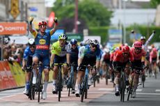 Mads Pedersen celebrates his win on stage one of the Criterium du Dauphine