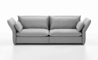 Grey sofa with high arm rests