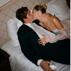 An image of @camillecharriere wearing one of the key bridal accessory trends of 2026.