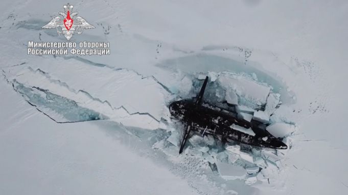 Three nuclear submarines owned by Russia maneuvered to break through several feet of Arctic ice at the same time.