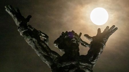 A photograph of the Harvest supermoon over the West Irian Liberation Monument in Jakarta in Indonesia on Monday. 