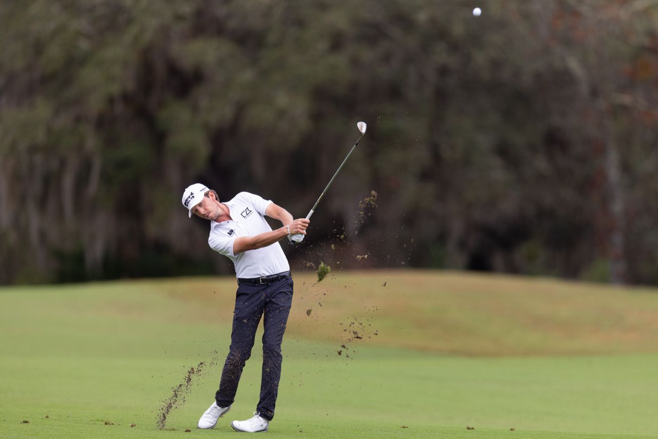 Bjorn Hellgren hits a wedge shot