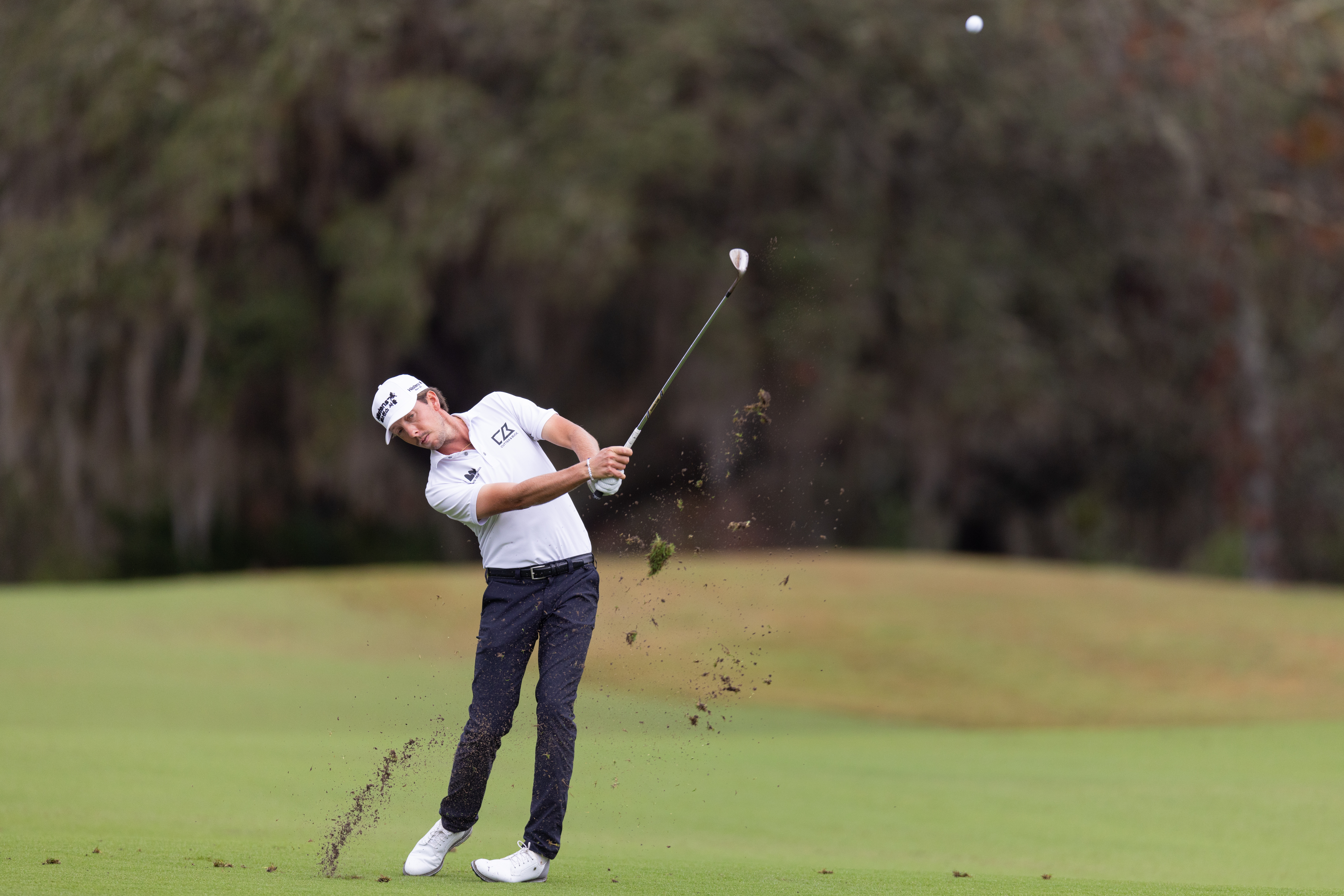 Bjorn Hellgren hits a wedge shot