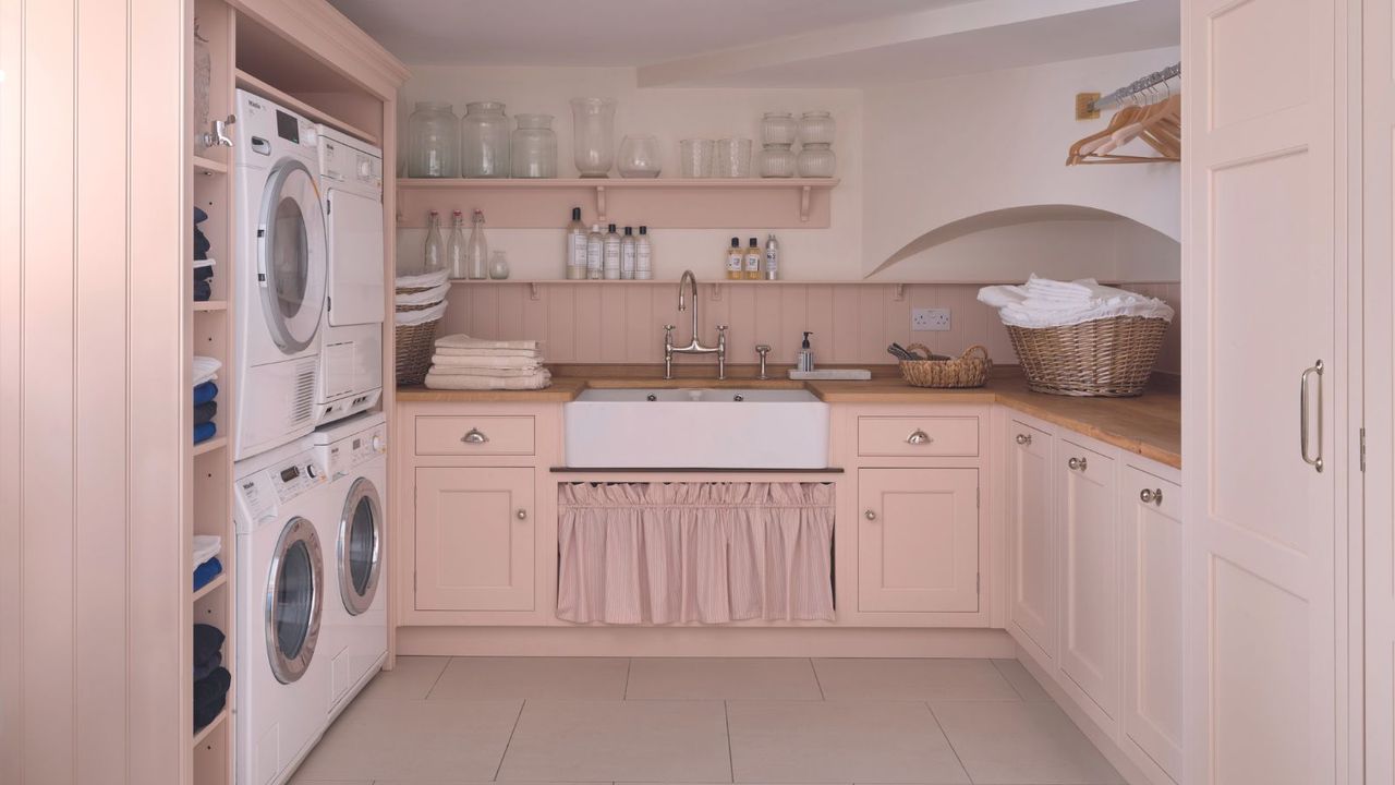 Laundry room in pale pink