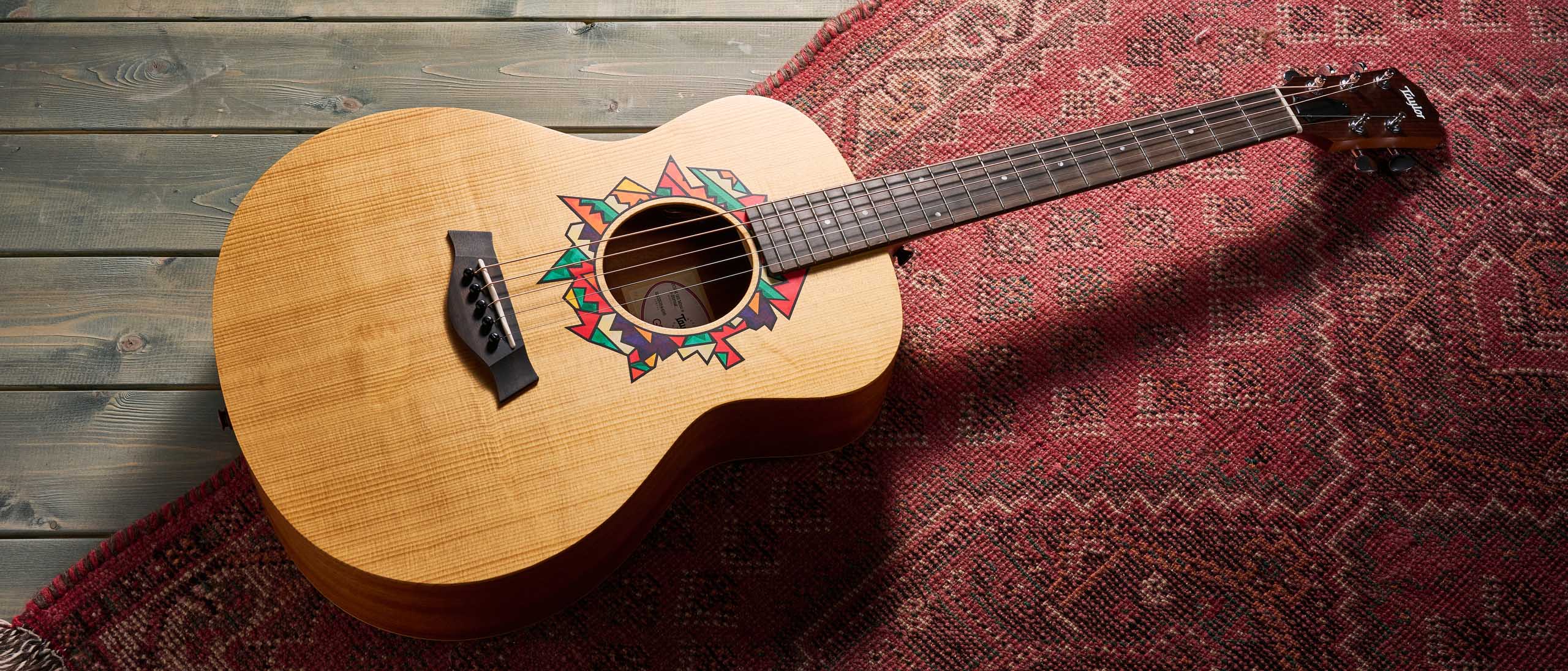 The Taylor Jacob Collier GS Mini is a compact five-string acoustic that encourages players to explore Collier's D-A-E-A-D tuning.