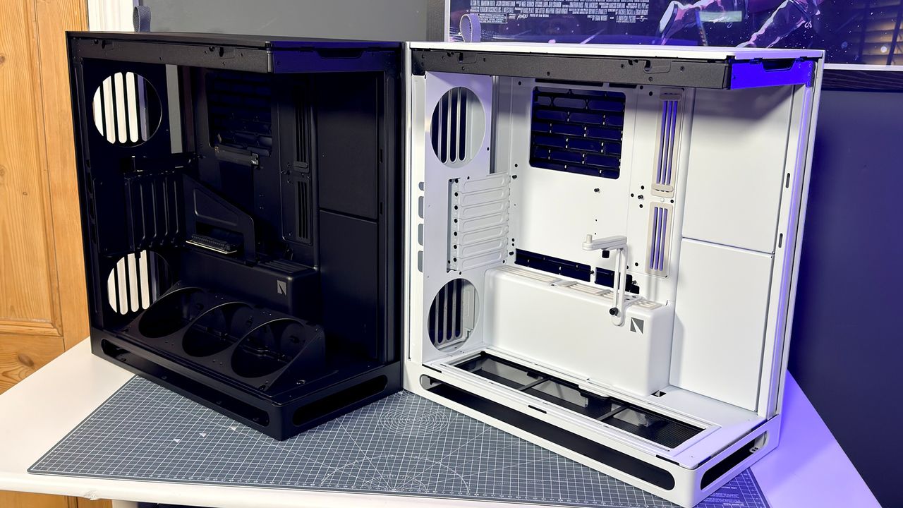 The Havn HS 360 PC case in black and white on a desk.