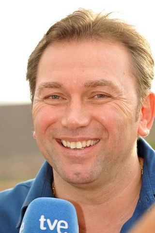 Johan Bruyneel looking quite happy with the way things are going.