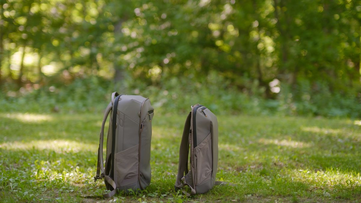 The Peak Design Travel 2-in-1 Backpack outdoors used by a photographer