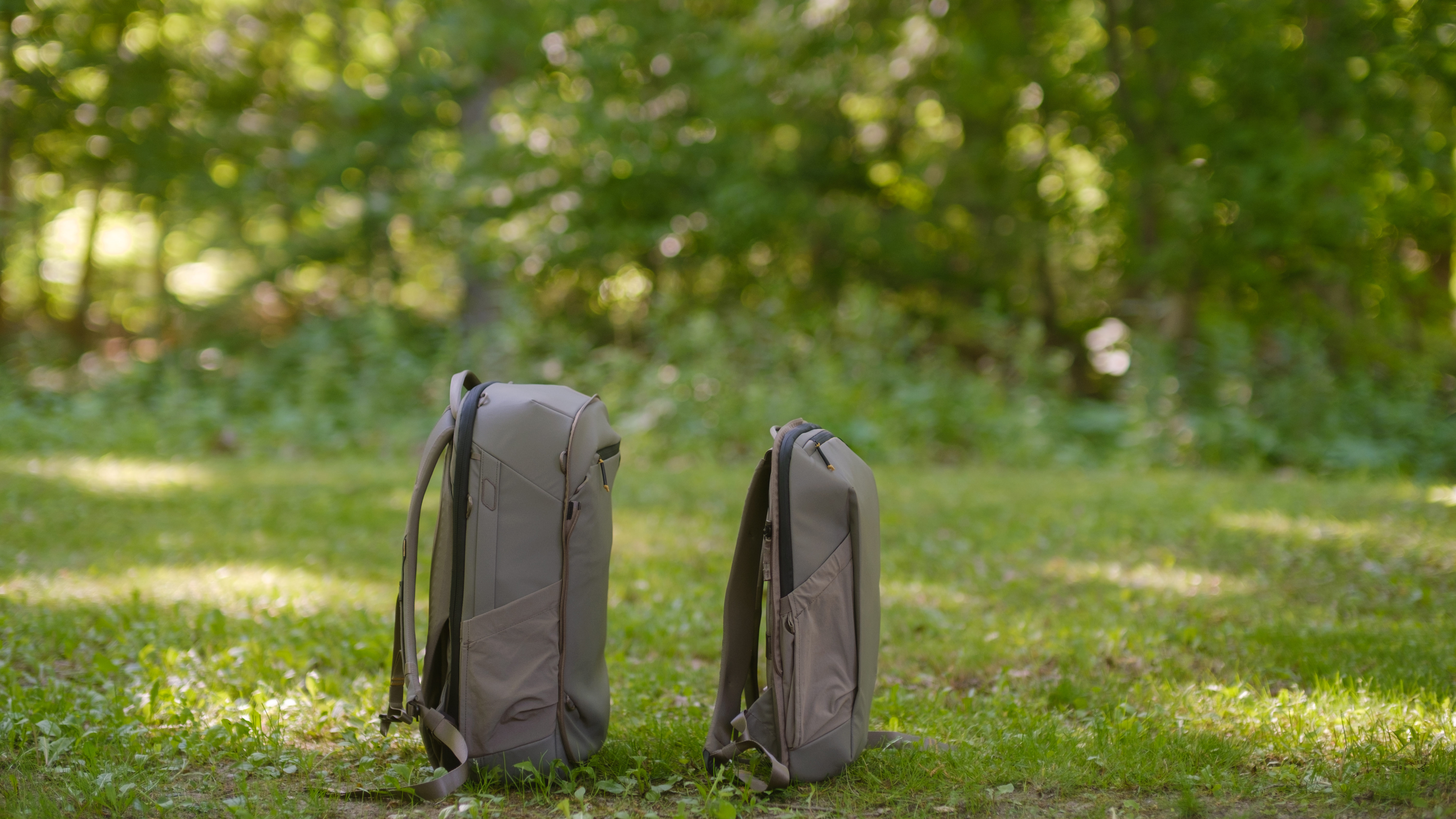 The Peak Design Travel 2-in-1 Backpack outdoors used by a photographer