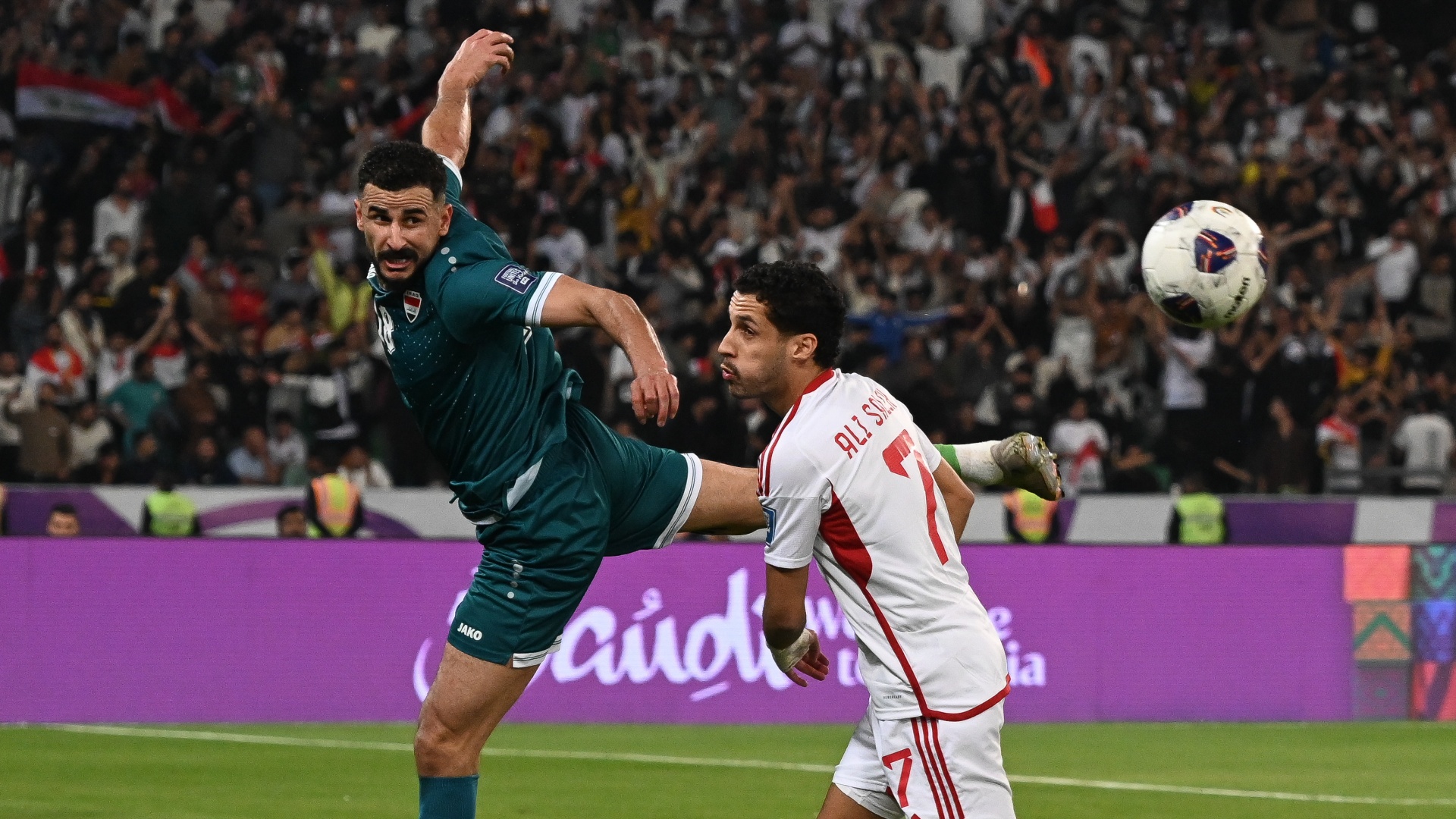 Iraq's Aymen Hussein heading the ball during the 2026 World Cup Qualification