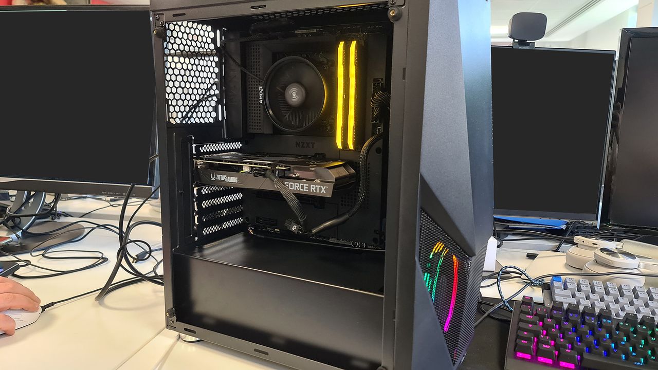 Budget PC case on a desk, including those from Aerocool, Bitfinix, and Kolink