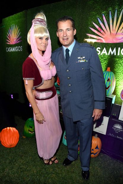 Molly Sims and Scott Stuber as Jeannie and Major Nelson