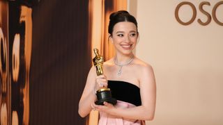 Mikey Madison poses with her Oscar after winning Best Actress for Anora 