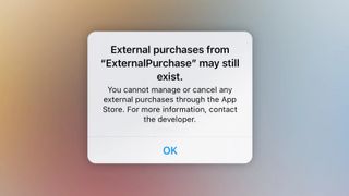 A mock-up of an iOS 15.5 warning telling users that they cannot manage a specific app's purchases through the App Store