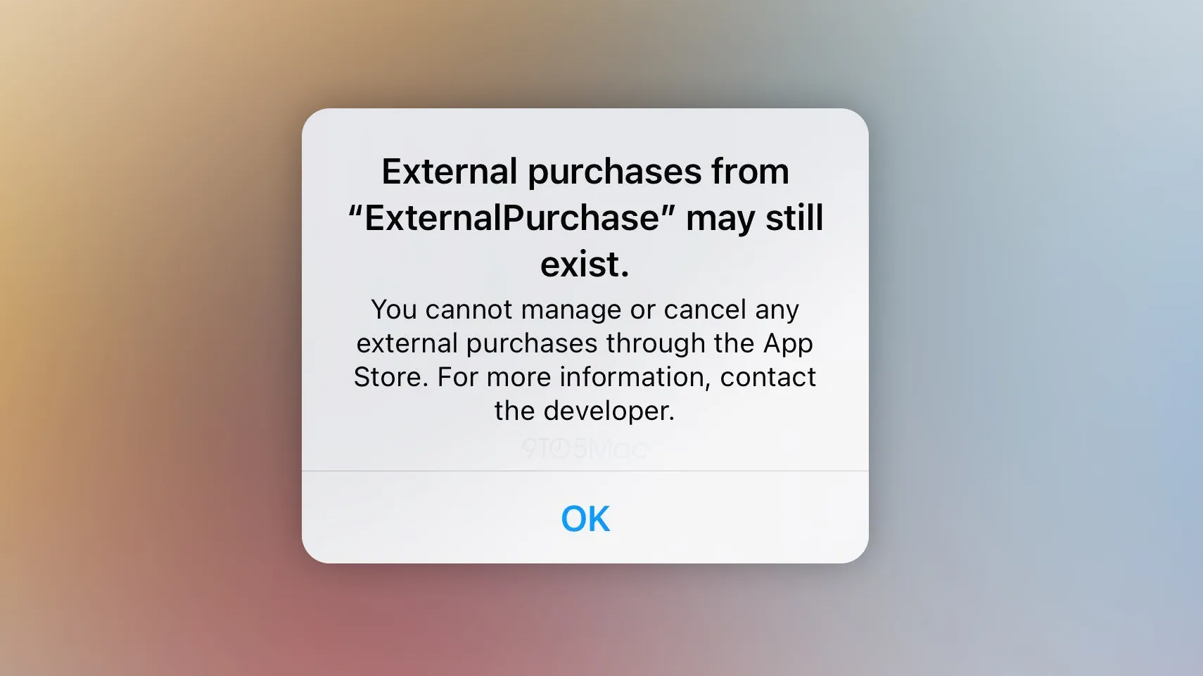 A mockup of an iOS 15.5 warning telling users that they cannot manage purchases for a specific app through the App Store
