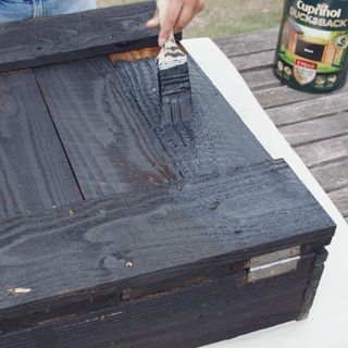 how to build an outdoor bar: painting wood
