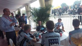 Bjarne Riis and his troops at the start