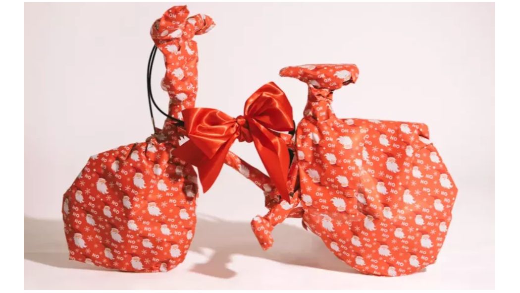 image of a gift wrapped bike for christmas 