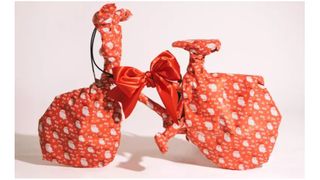 image of a gift wrapped bike for christmas 