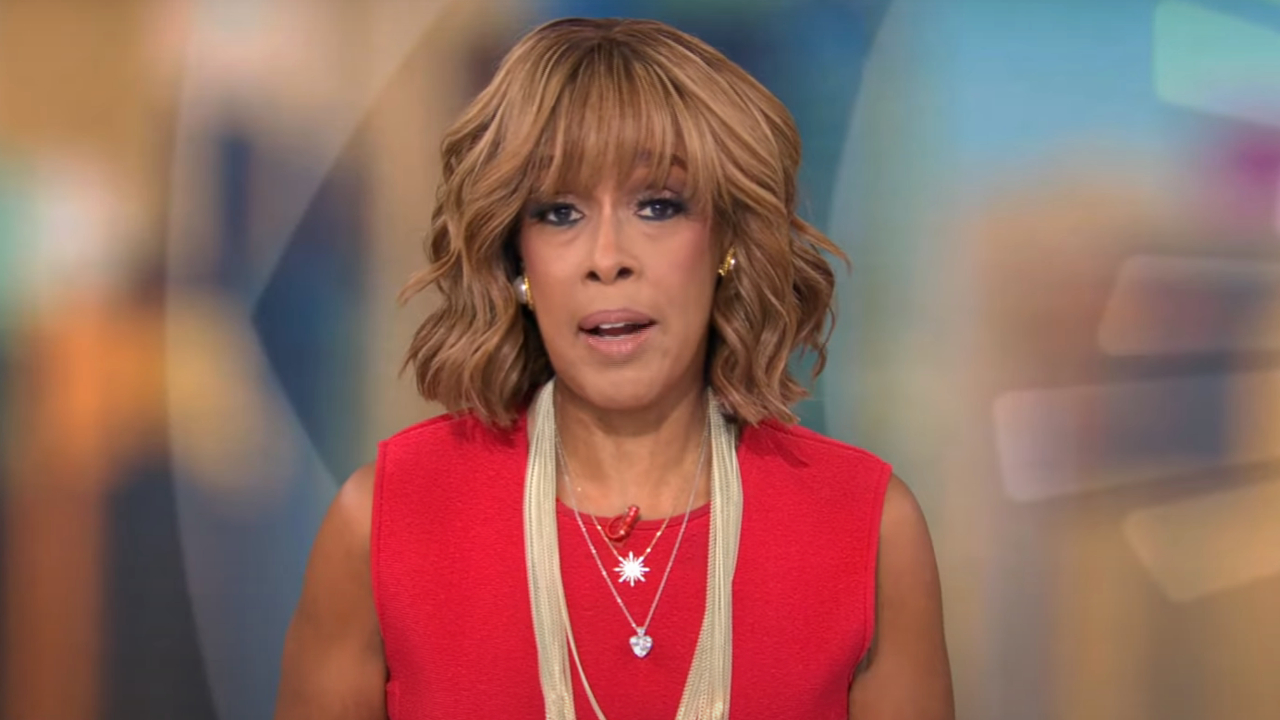 Gayle King sits on set during a report on CBS Mornings.