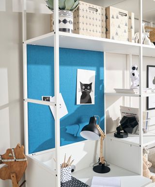 teenage bedroom with white desk shelves