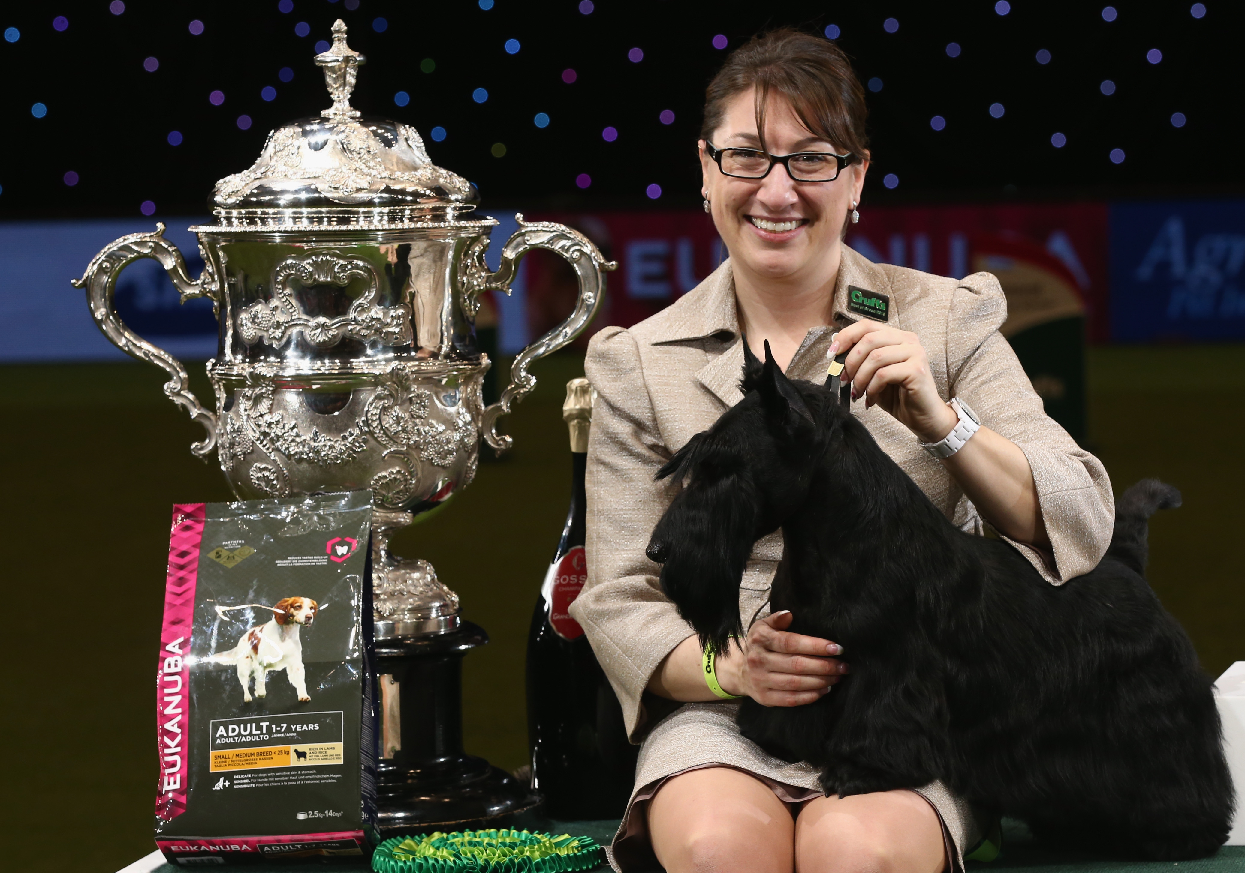 Scottish terrier McVan&amp;rsquo;s To Russia With Love with handler Ms M L Khenkina and the Crufts Best in Show trophy at the NEC in Birmingham, 2015.