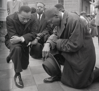 Martin Luther King and Ralph Abernathy take the knee in Alabama 1965