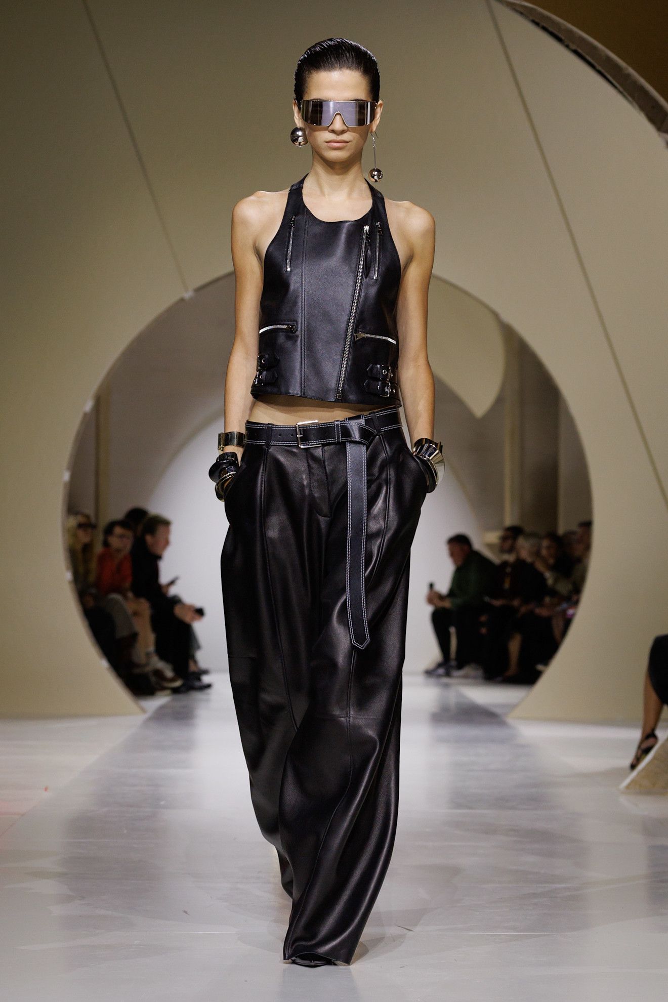 a model walks the givenchy runway.