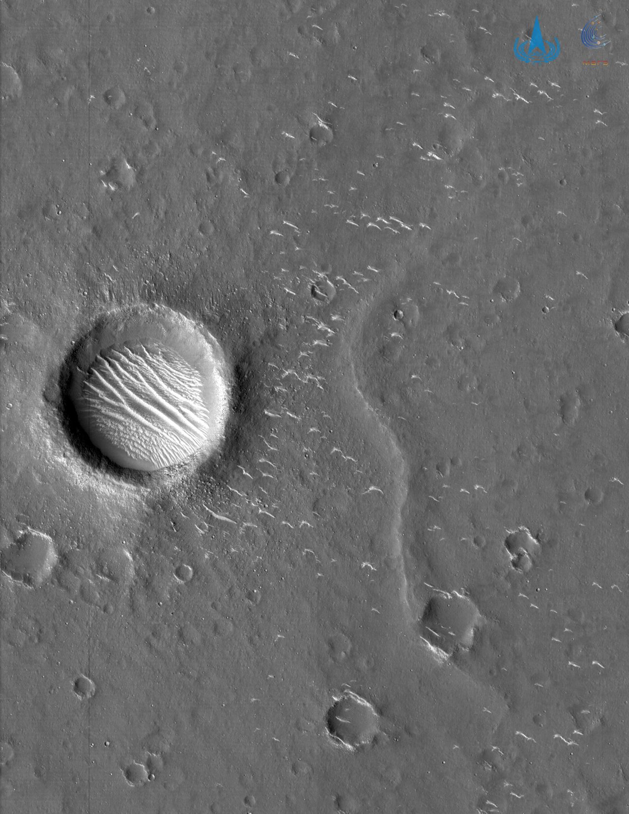 An image of Mars taken by China's Tianwen-1 spacecraft at an altitude of about 220 miles (350 kilometers).