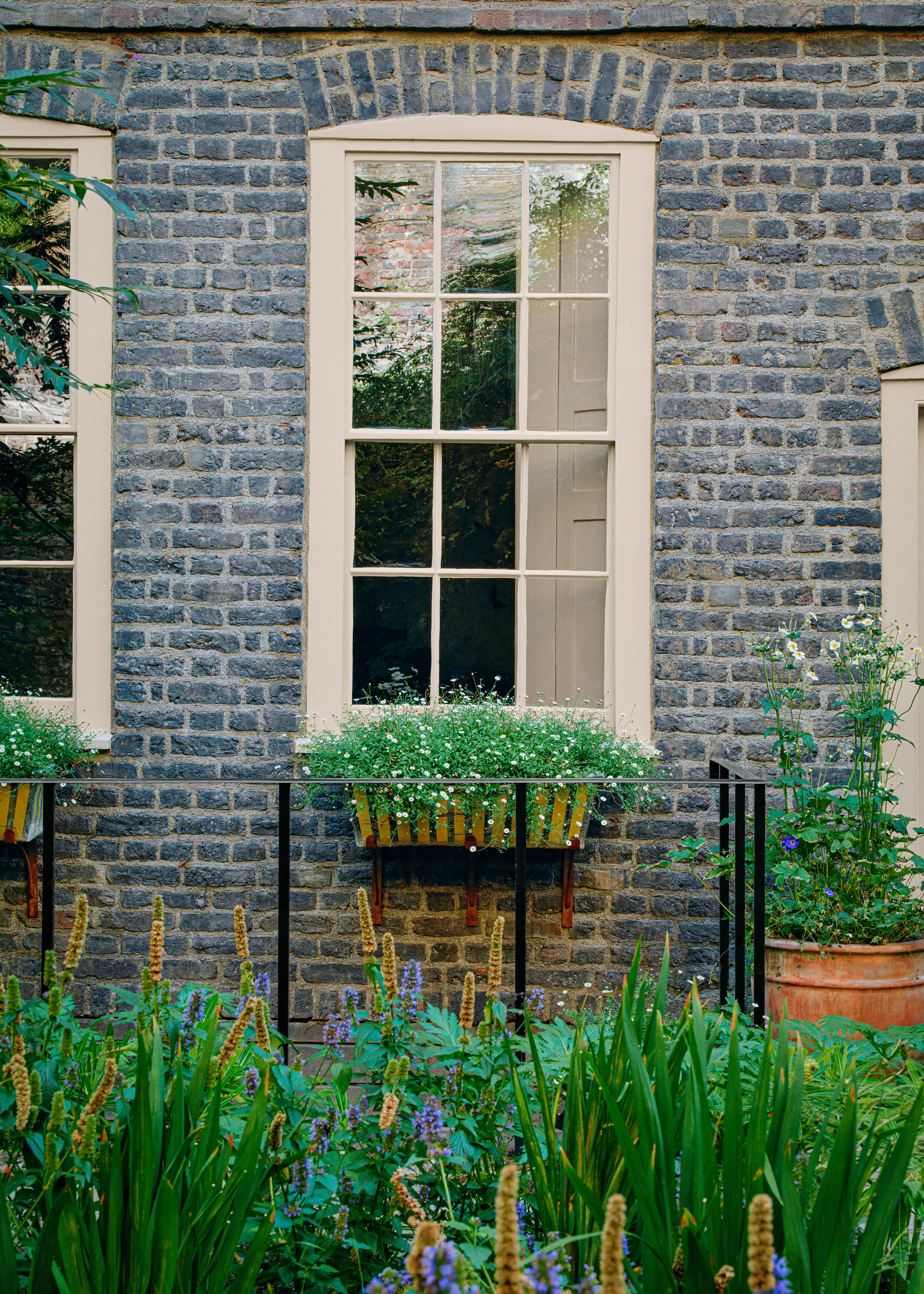 period home with painted window frames and window boxes