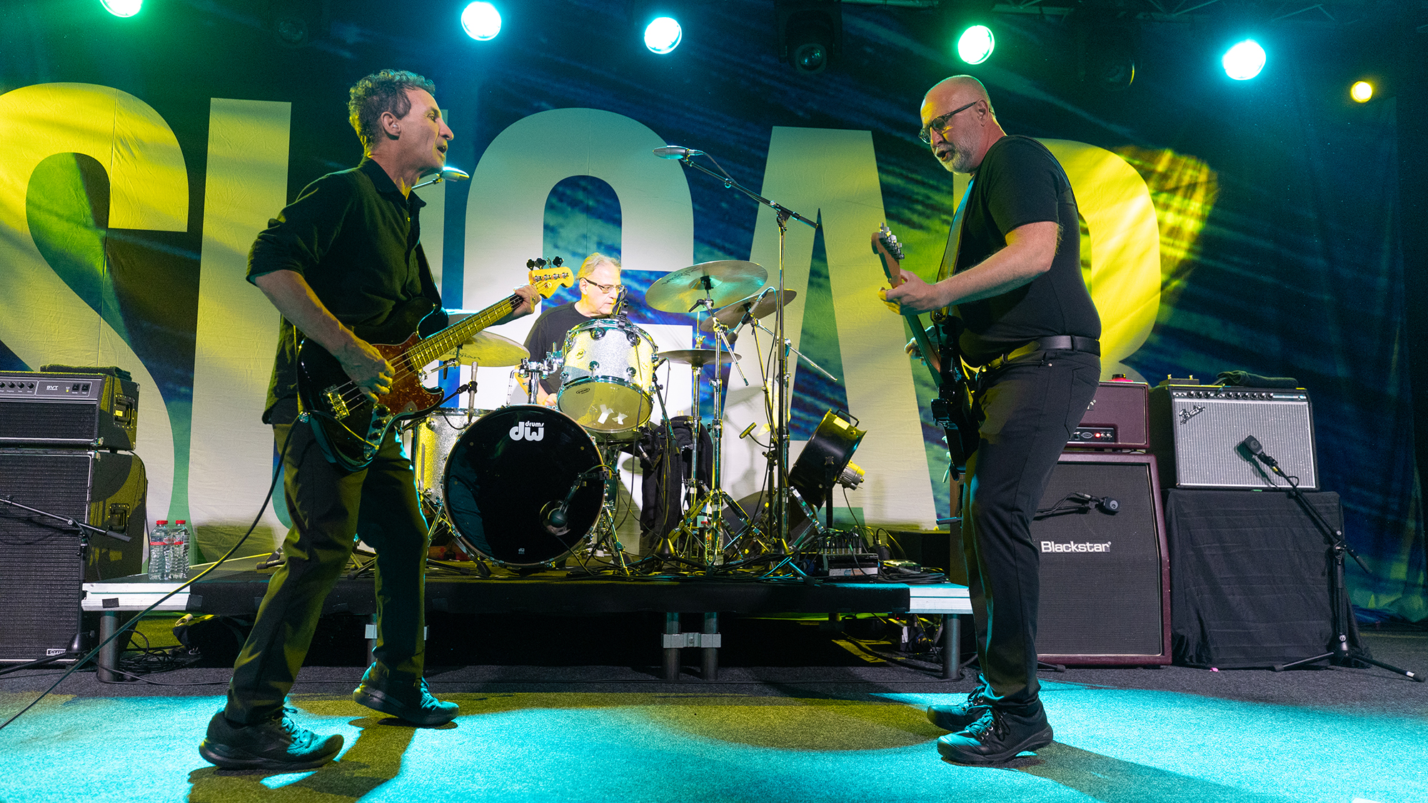 Sugar perform in Dublin, Ireland, May 27, 2026. (from left) David Barbe, Malcolm Travis and Bob Mould