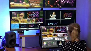 A woman using NetOn.Live production platform with multiple monitors.
