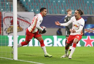 RB Leipzig’s Justin Kluivert celebrates scoring his side’s third goal against Manchester United