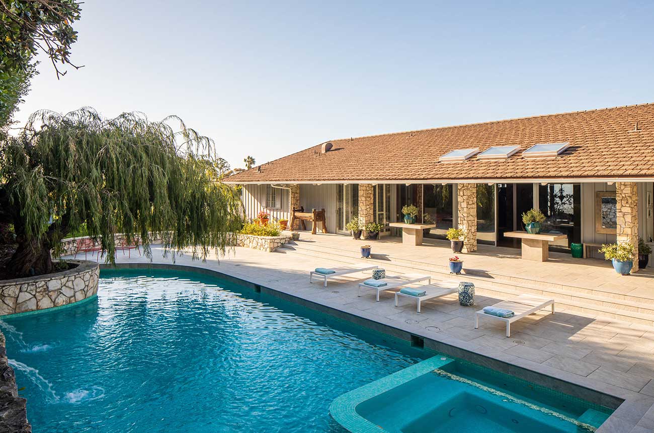 Outdoor pool at LA vineyard property listed by Sotheby's International Realty.