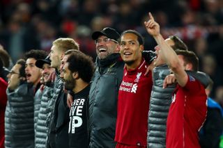 Jurgen Klopp celebrates with his Liverpool players after the Reds' incredible 4-0 win to overturn a 3-0 first-leg deficit in the Champions League semi-finals at Anfield in May 2019.