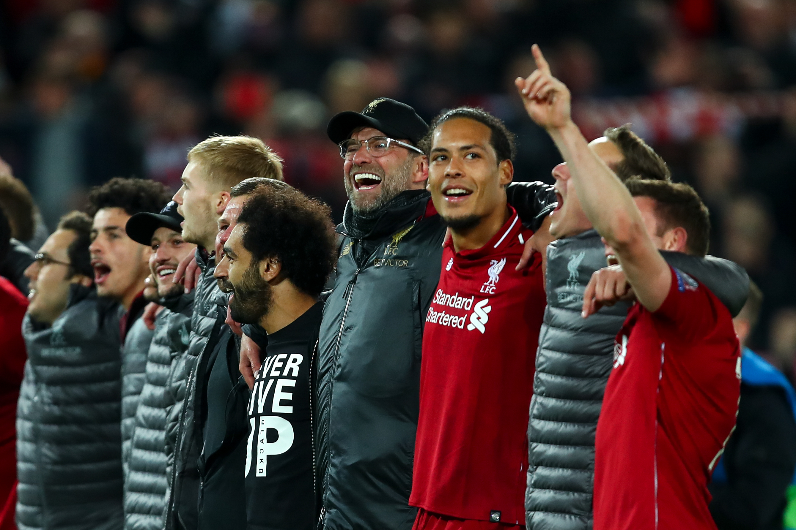 Jurgen Klopp celebrates with his Liverpool players after the Reds' incredible 4-0 win to overturn a 3-0 first-leg deficit in the Champions League semi-finals at Anfield in May 2019.