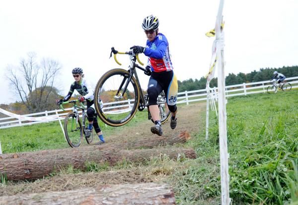 Series leader Andrea Smith (Ladies First Racing) and Sally Annis (crossresults.com p/b JRA Cycles) head through the logs.