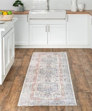 Runner rug in kitchen on hard wood floor