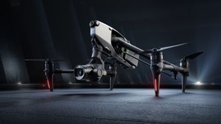 The DJI Inspire 3 drone on the ground in a dark hangar