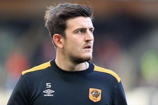 Harry Maguire of Hull City looks on during the warm up prior to kick off during the Premier League match between Hull City and Stoke City at KC Stadium on October 22, 2016 in Hull, England.