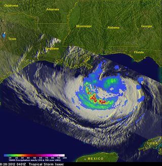 NASA's TRMM satellite captured this image of Isaac as it was approaching the northern Gulf coast at 4:01 UTC, August 28 (12:01 EDT). Heavy rainfall is shown in red, moderate rain in green and light rain in blue.